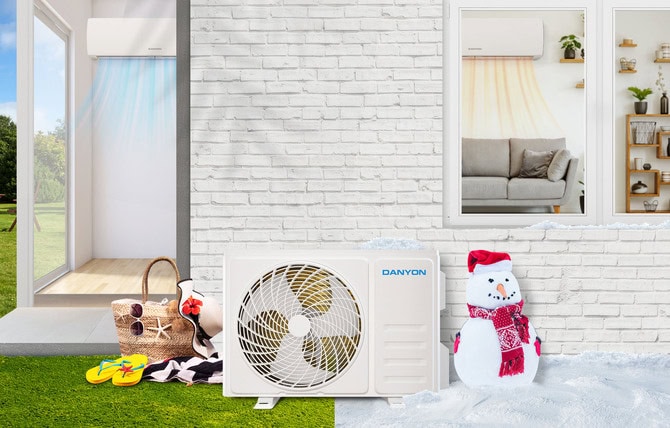 Klimaanlage vor dem Haus zwischen Sonne und Schnee