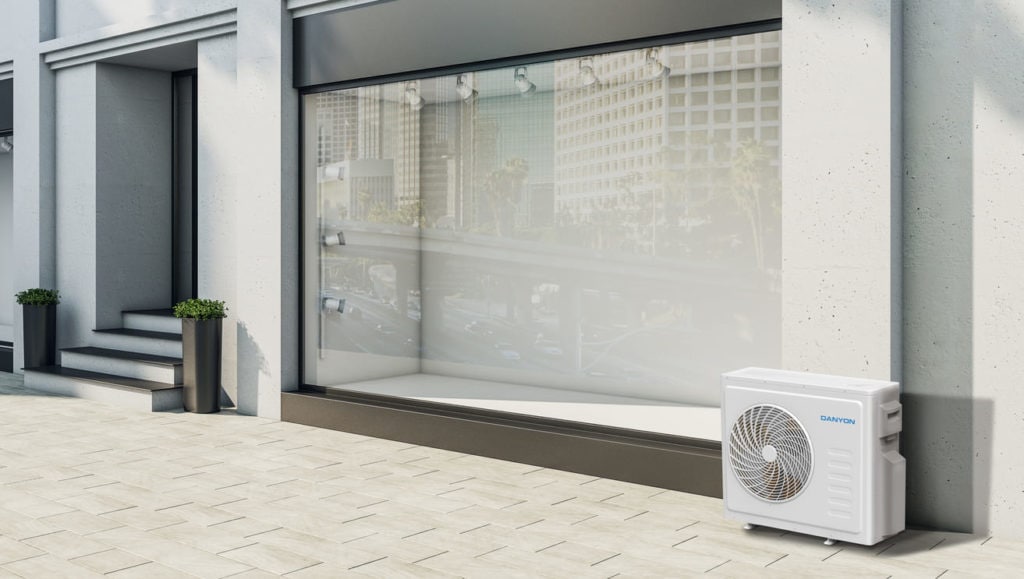 Moderne Danyon Klimaanlage vor Geschäftshaus, effiziente Kühlung für Gewerbeimmobilien.